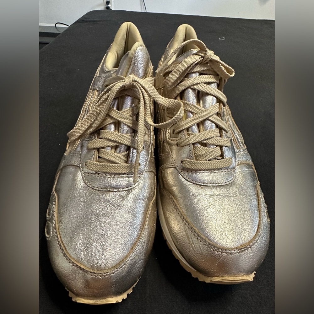 Gold ASICS sneakers
